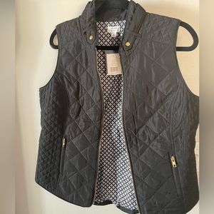 Black with gold accents puffer vest